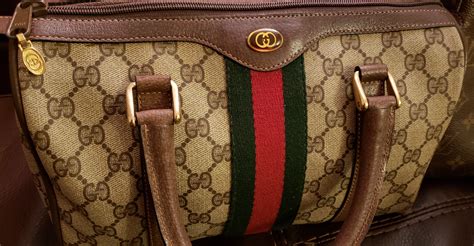 how to tell if a real gucci purse